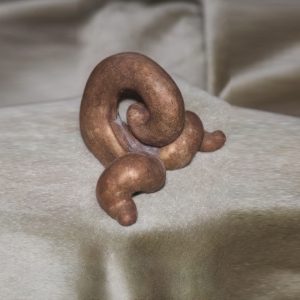 Undoing itself - cast bronze